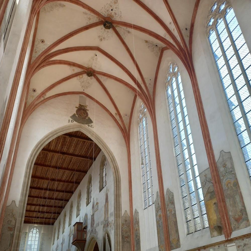 Interior of a church with vaulted ceilings.